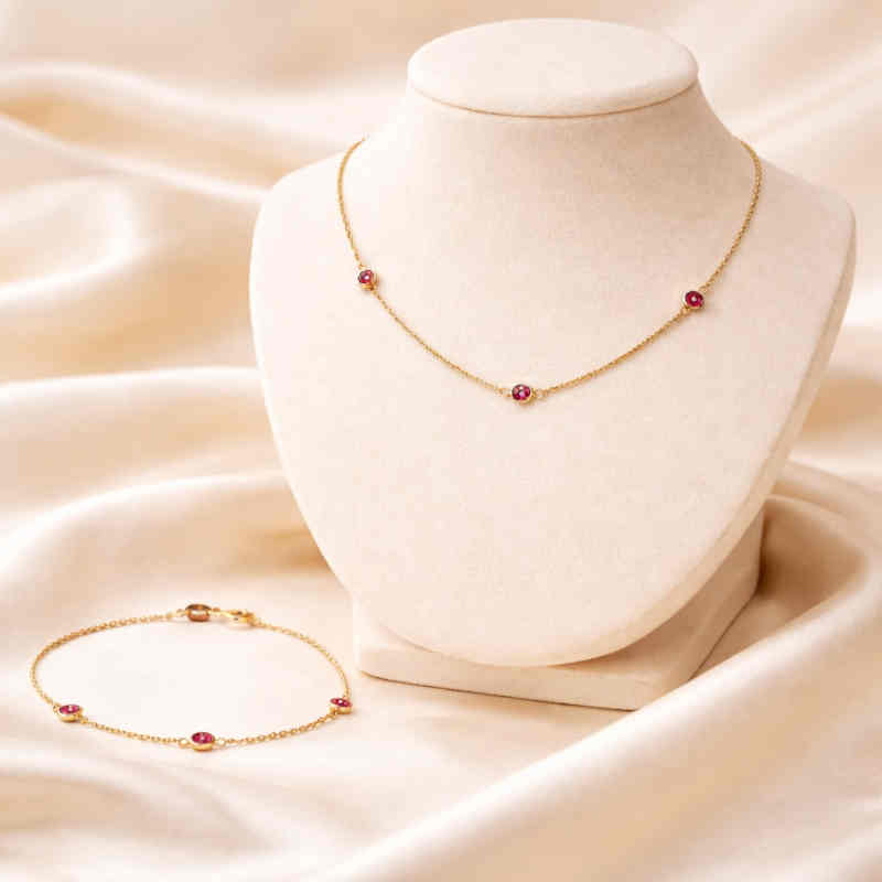 Комплект от жълто злато с розови шпинели